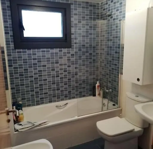 En Piso Compartido Y Wc Compartido Cerca De Playa De Samil Апартаменты